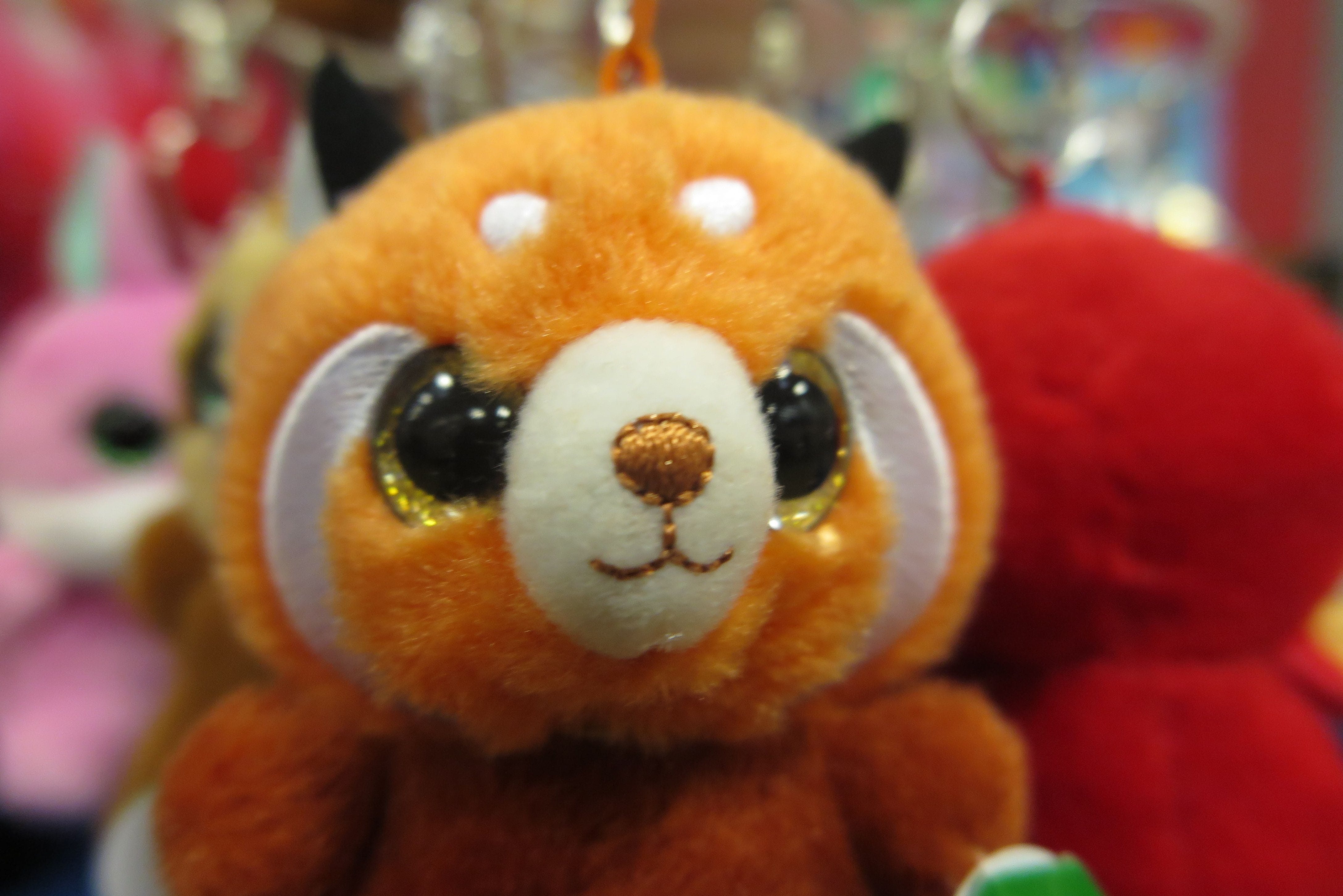 A photo of the plush clip-on version of Hapee the Red Panda from Yoohoo & Friends.